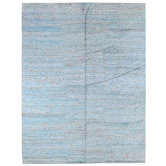 Tapis turquoise et argenté