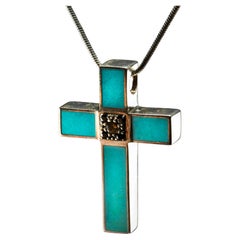Croce in turchese e argento sterling con zaffiri gialli e blu