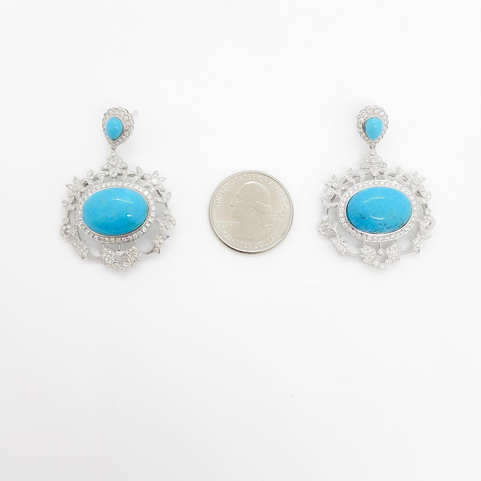 Gorgeous big turquoise cabochons with 2.00 ct. good quality white diamond rounds.  Handmade in 18k white gold.  These dangle push back earrings are beautiful.