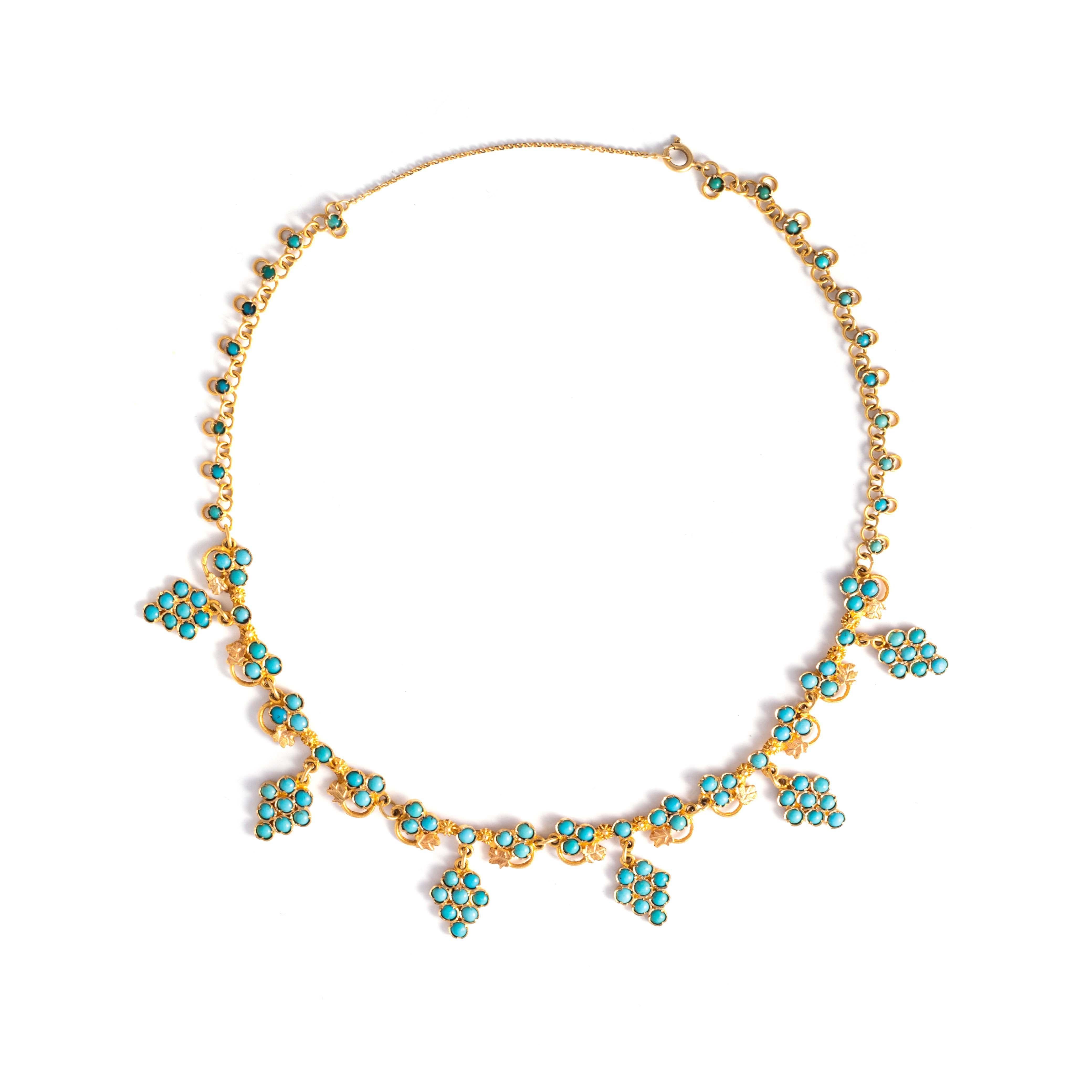 18K yellow gold necklace set by cabochon-cut turquoise (not tested).
Length: 42.80 centimeters. 
Gross weight 27.68 grams.