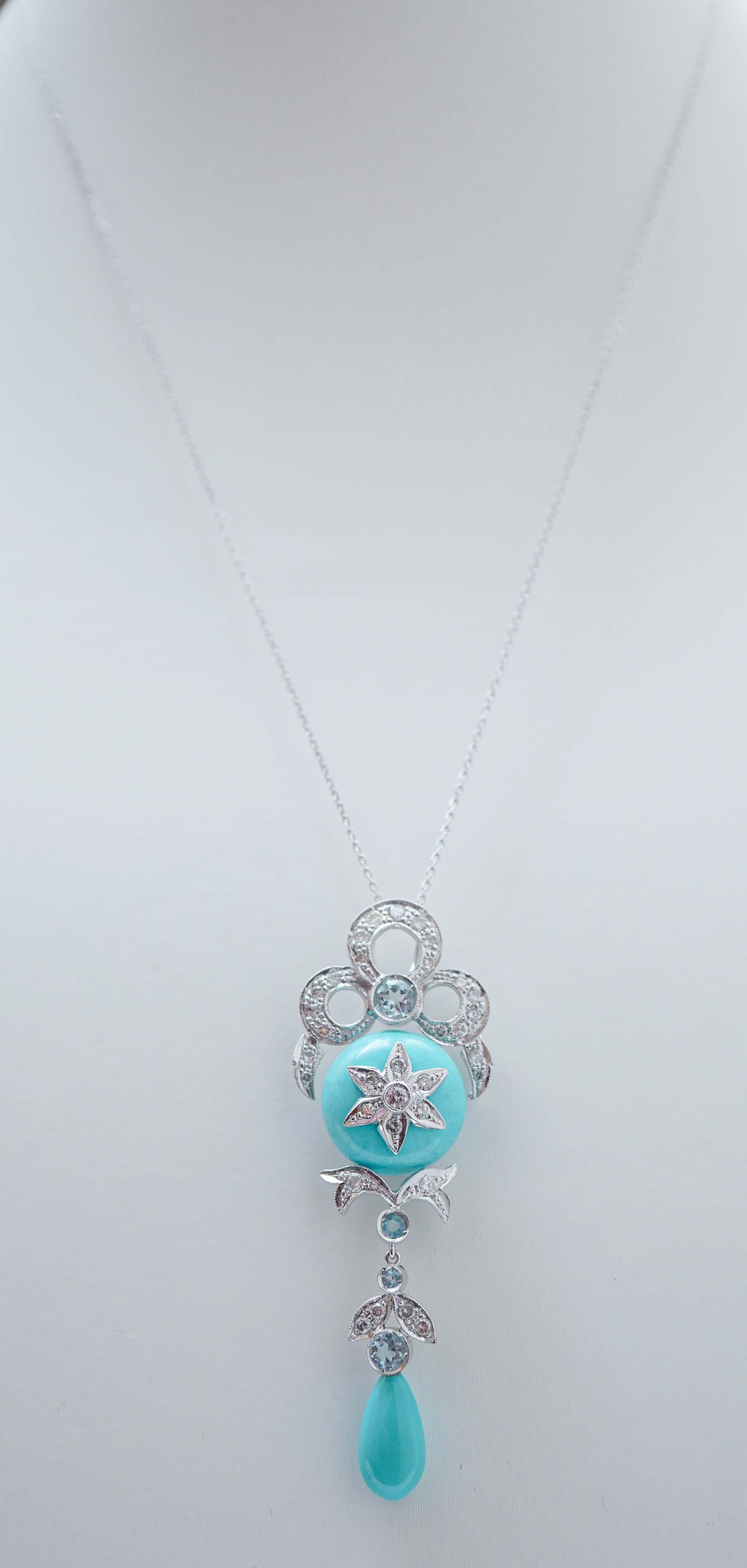 Fantastica collana con ciondolo in platino montata con turchesi, diamanti e topazi. La catena in oro 9 kt è inclusa.
Questa collana con ciondolo è stata realizzata totalmente a mano da maestri orafi italiani ed è in perfette condizioni.
Diamanti