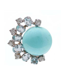Orecchini con turchese, acquamarina, diamanti, oro bianco 18 carati e oro rosa.