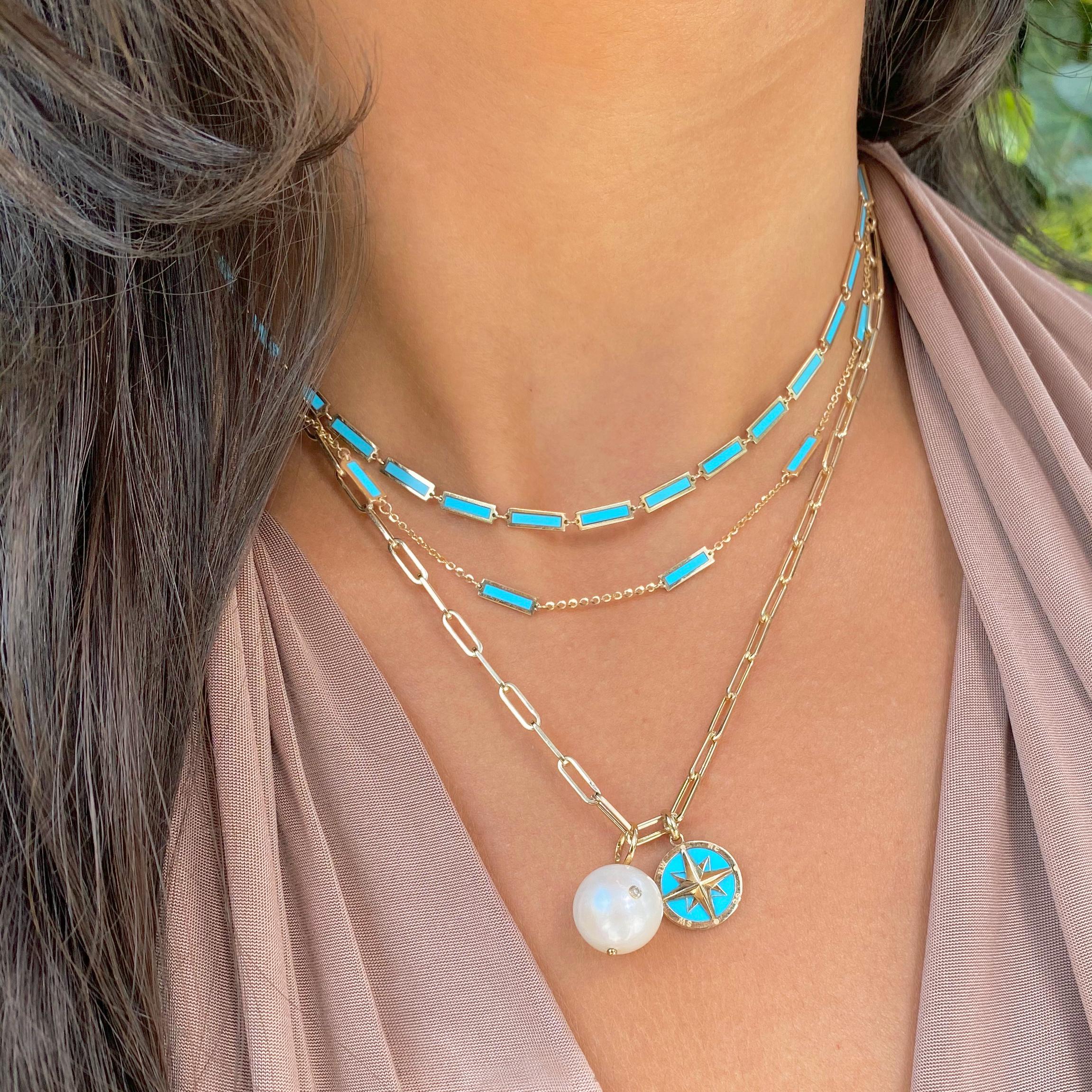Looking for the ultimate addition to your jewelry collection? Look no further than this stunning yet simple necklace! With its unique and eye-catching design, this piece is guaranteed to add a pop of color to any outfit. Layer it with your favorite