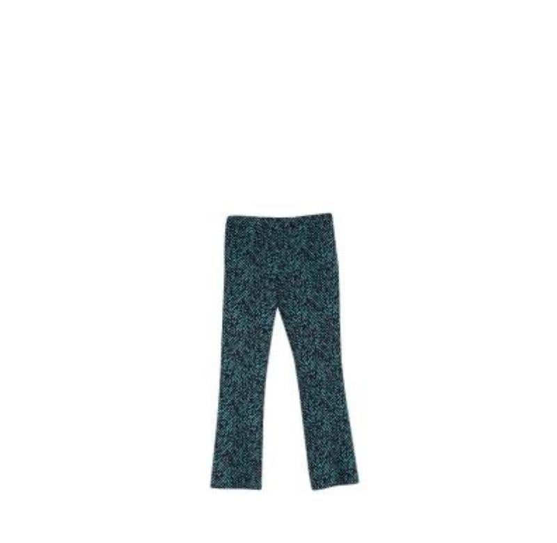 Prada Turquoise & Black Herringbone Printed Kickflare Trousers
 
 - Herringbone print in turquoise and black
 - Fine wool cloth
 - Concealed side zip
 - High rise, cropped leg
 
 Materials
 97% Virgin Wool 
 3% Elastane Strap 
 100% Silk 
 
 Made in