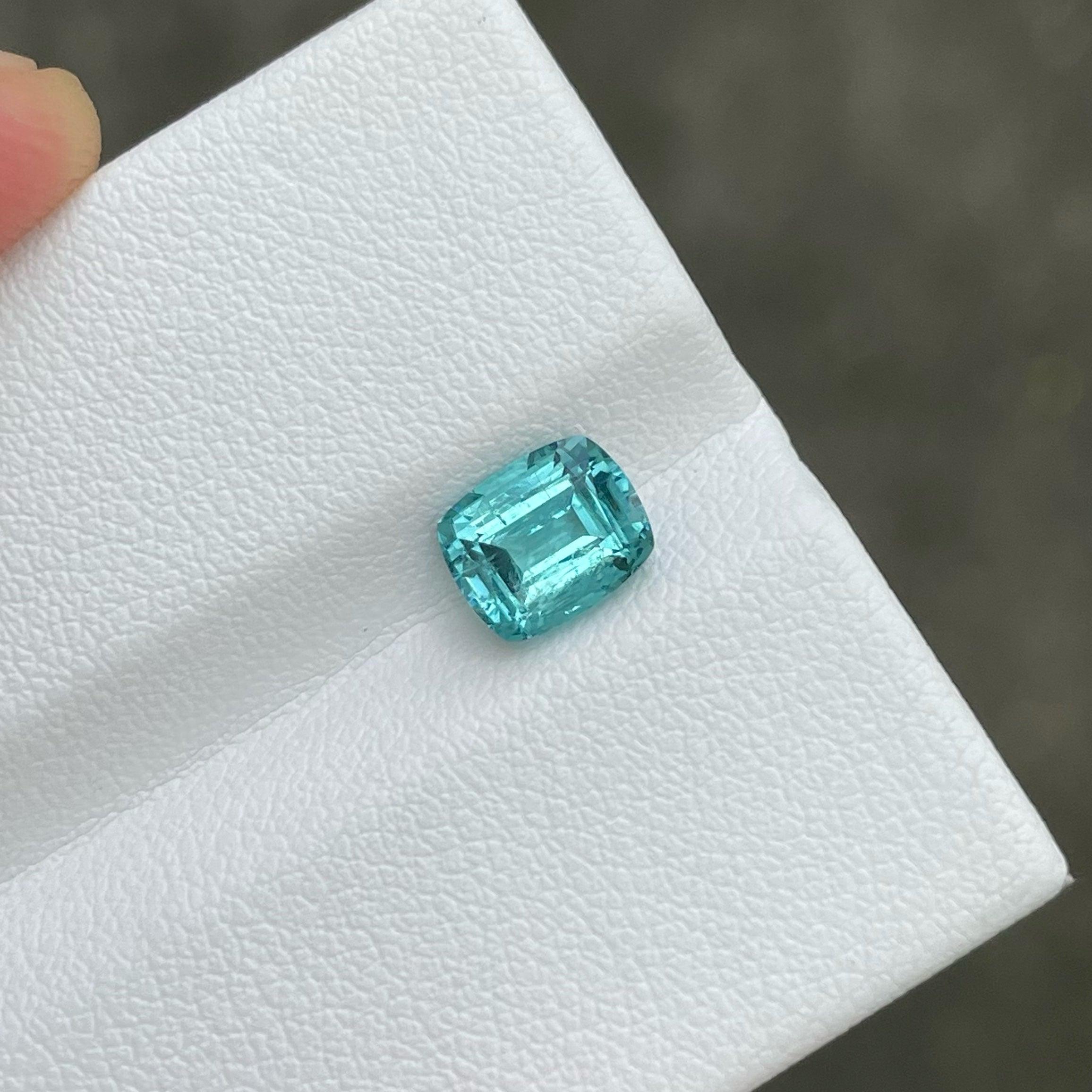 Turquoise Blue Afghan Tourmaline of 1.65 carats from Afghanistan has a wonderful cut in a Cushion shape, incredible Blue color. Great brilliance. This gem is  SI Clarity.

Product Information:
GEMSTONE TYPE:	Turquoise Blue Afghan