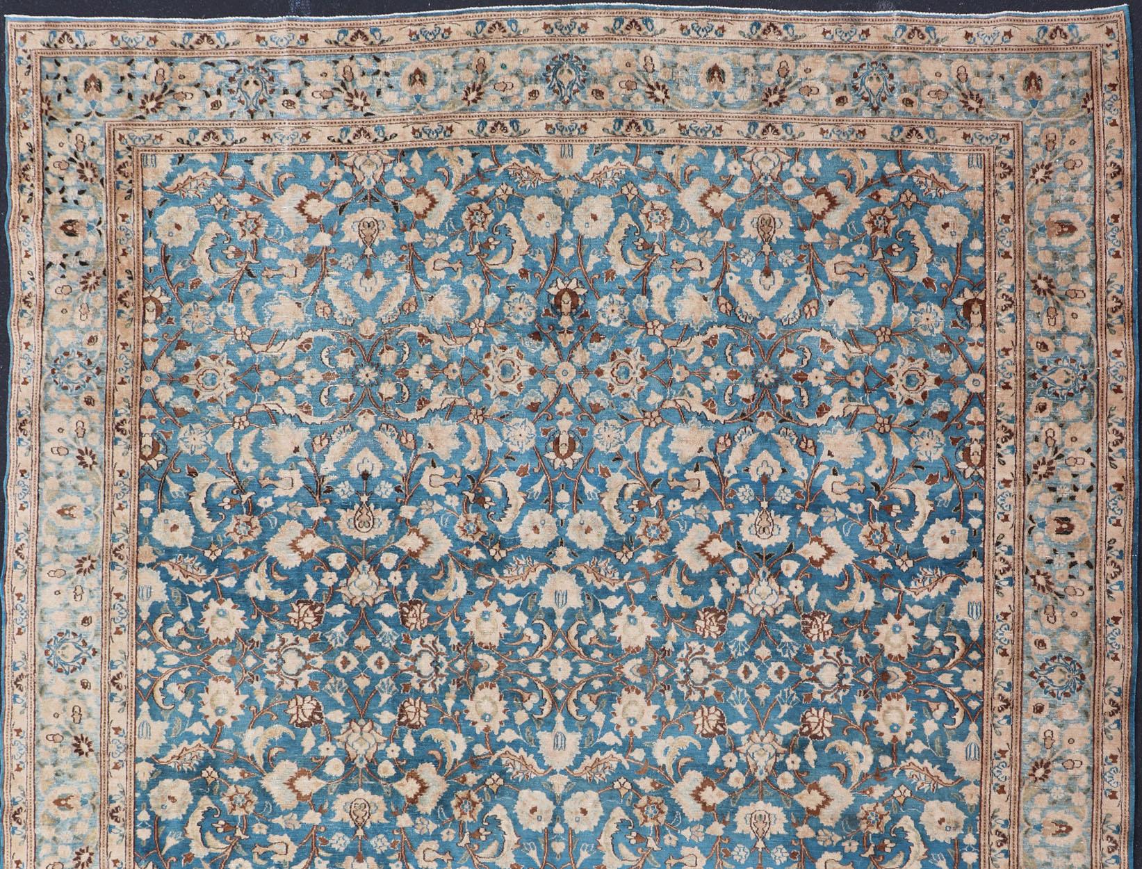 Turquoise blue background with light blue border and light brown highlights antique all-over geometric Persian Khorassan rug, rug V21-0118, country of origin / type: Iran / Khorassan, circa 1920

This antique Persian Khorassan carpet from 1920s