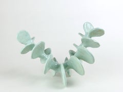 Escultura de cerámica azul turquesa hecha a mano, única en su especie