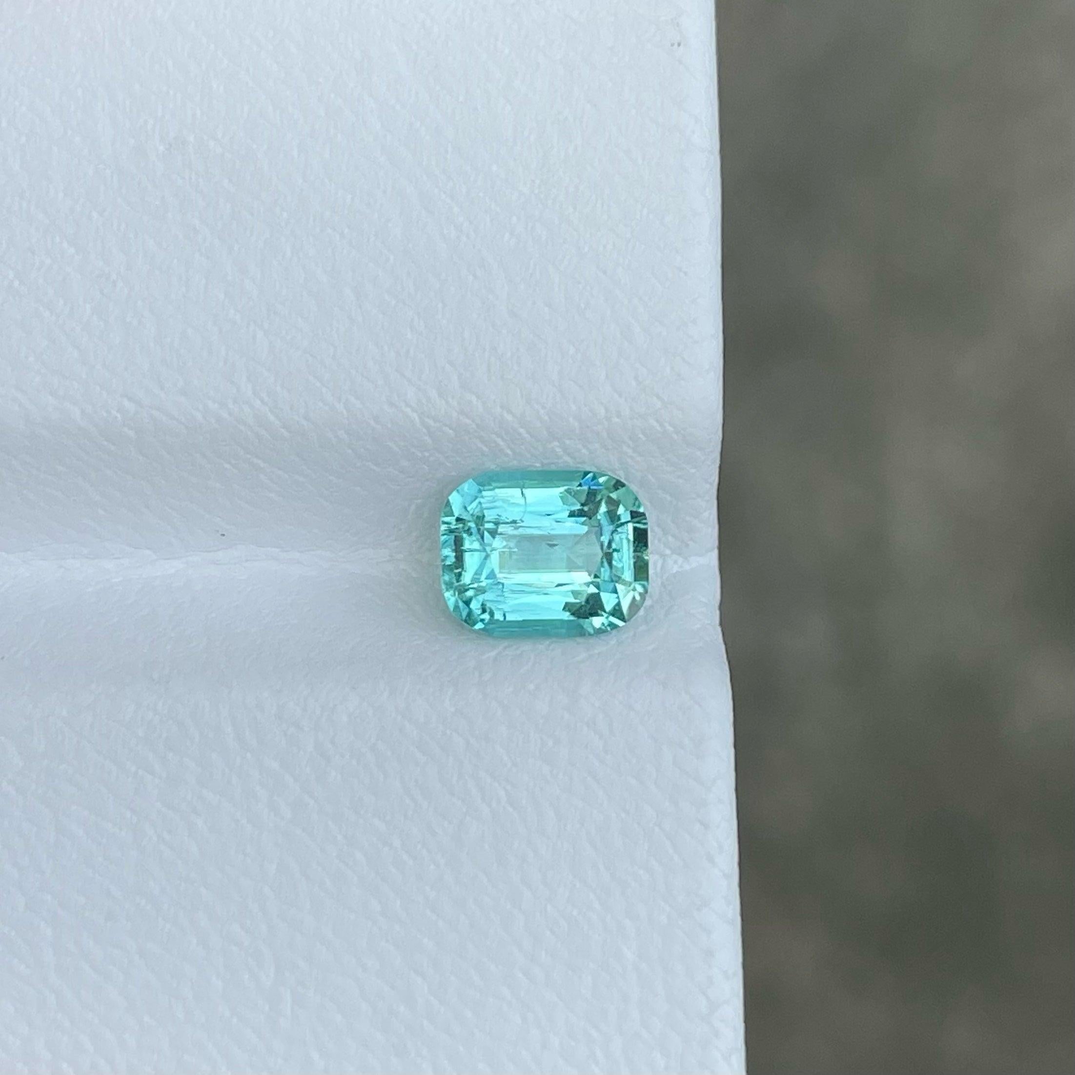 Turquoise Blue Natural Tourmaline From Afghanistan of 1.35 carats from Afghanistan has a wonderful cut in a Cushion shape, incredible Blue color. Great brilliance. This gem is totally SI Clarity.

Product Information:
GEMSTONE TYPE:	Turquoise Blue