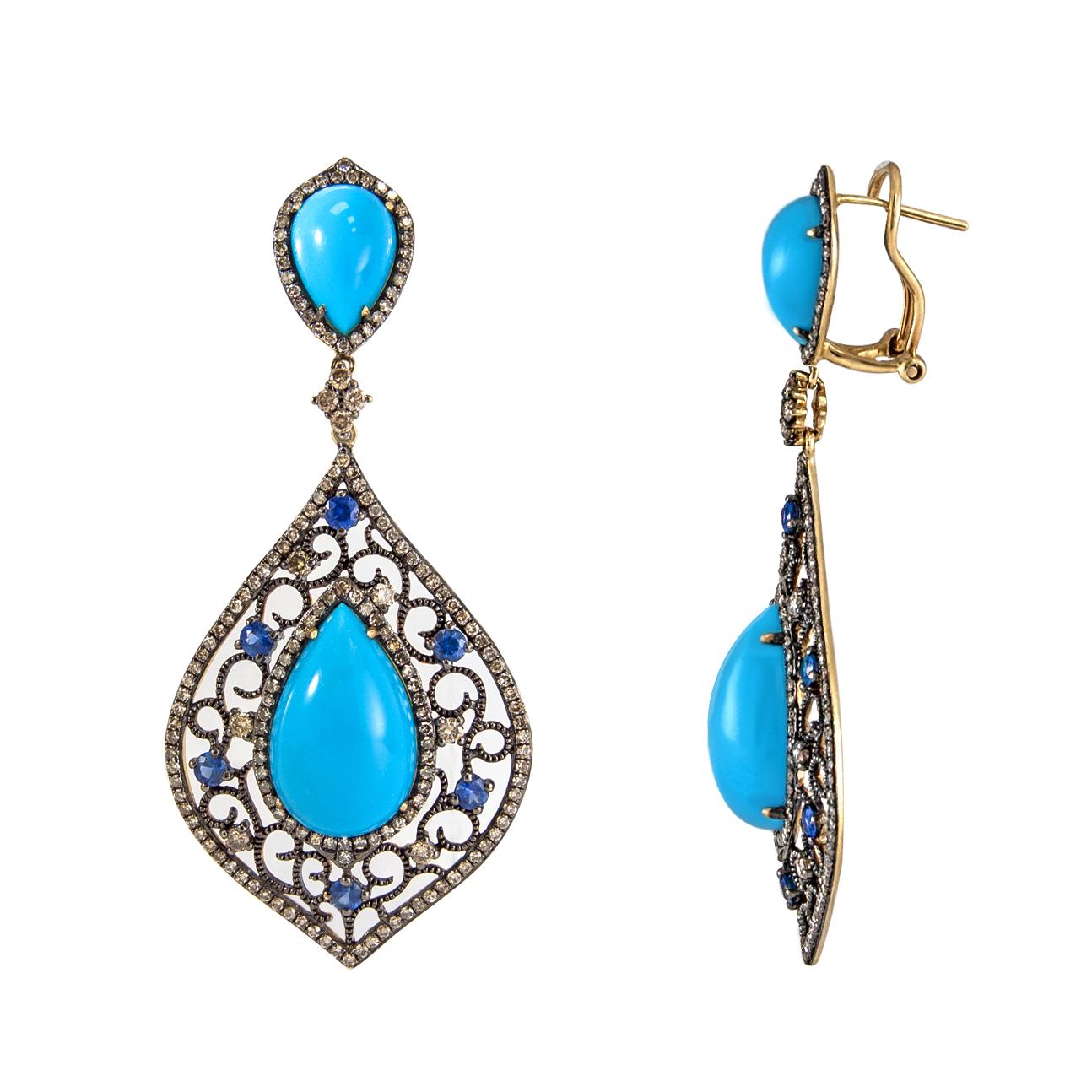 Glamorous and elegant dangle drop earrings hand crafted with pear shape turquoises (18.75 carats) light blue sapphires (1.20 carats) and champagne color diamonds (2.30 carats)  with black rhodium plating over 14 karat yellow gold to create these