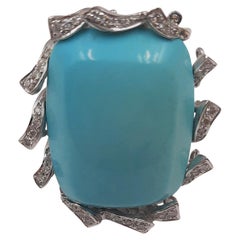 Bague en or blanc 18 carats avec turquoise et diamant taillé en brillant