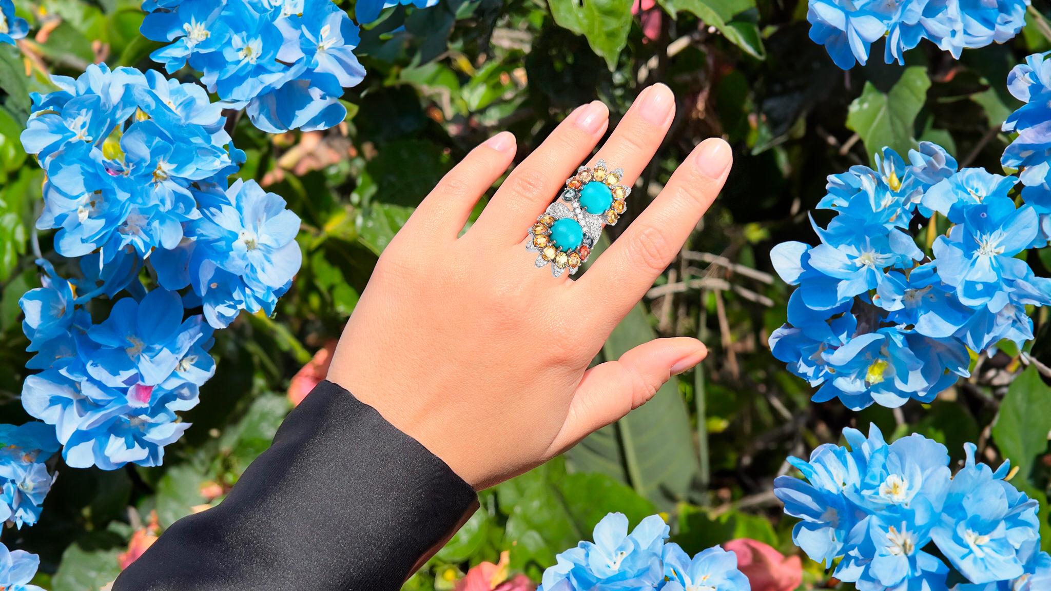 It comes with the Gemological Appraisal by GIA GG/AJP
All Gemstones are Natural
2 Turquoise = 8.86 Carats
16 Multicolor Sapphires = 6.70 Carats
117 Diamonds = 1.09 Carats
Metal: Rhodium Plated Sterling Silver
Ring Size: 7* US
*It can be resized