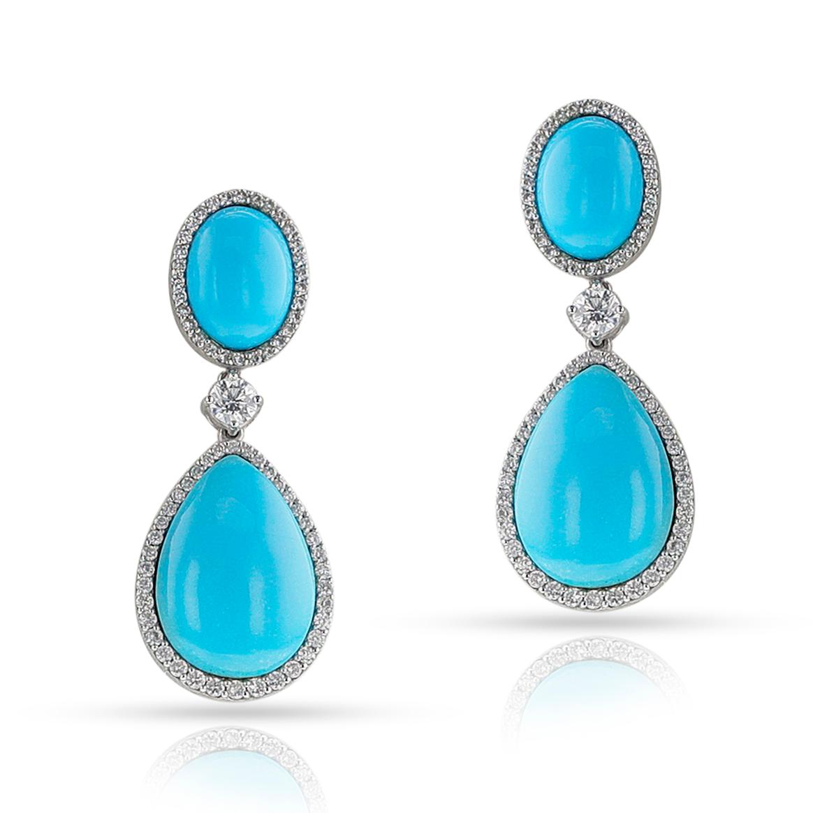 A pair of Turquoise Cabochon and Diamond Dangling Earrings made in 18k Yellow Gold with French import marks. Dimensions: 1.65 inch x 0.63 inch. Total Weight: 15.29 grams.