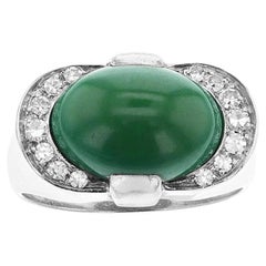 Bague en turquoise cabochon et diamants, 18 carats