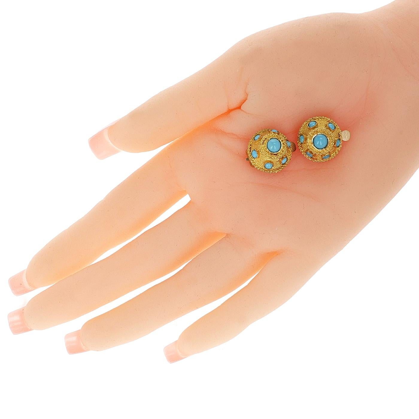 A pair of Turquoise and Gold Earrings. The set consists of: Two pairs of earrings, a ring and a bracelet.
