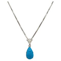 Turquoise Cabochon Pear Shape and White Diamond Pendant Necklace in Platinum