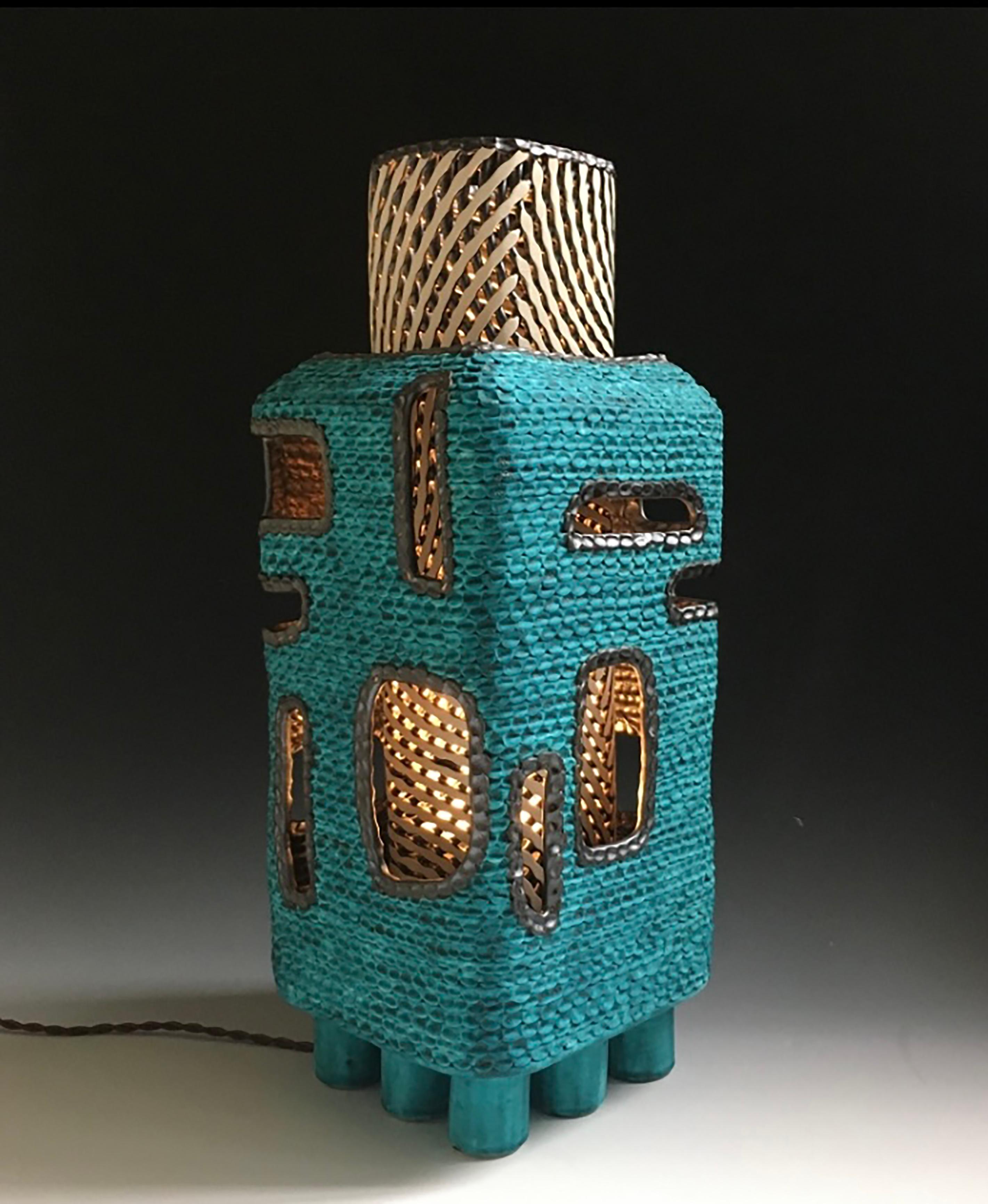 Turquoise Lantern has two parts, the outer shell and the insert. The outer shell is 