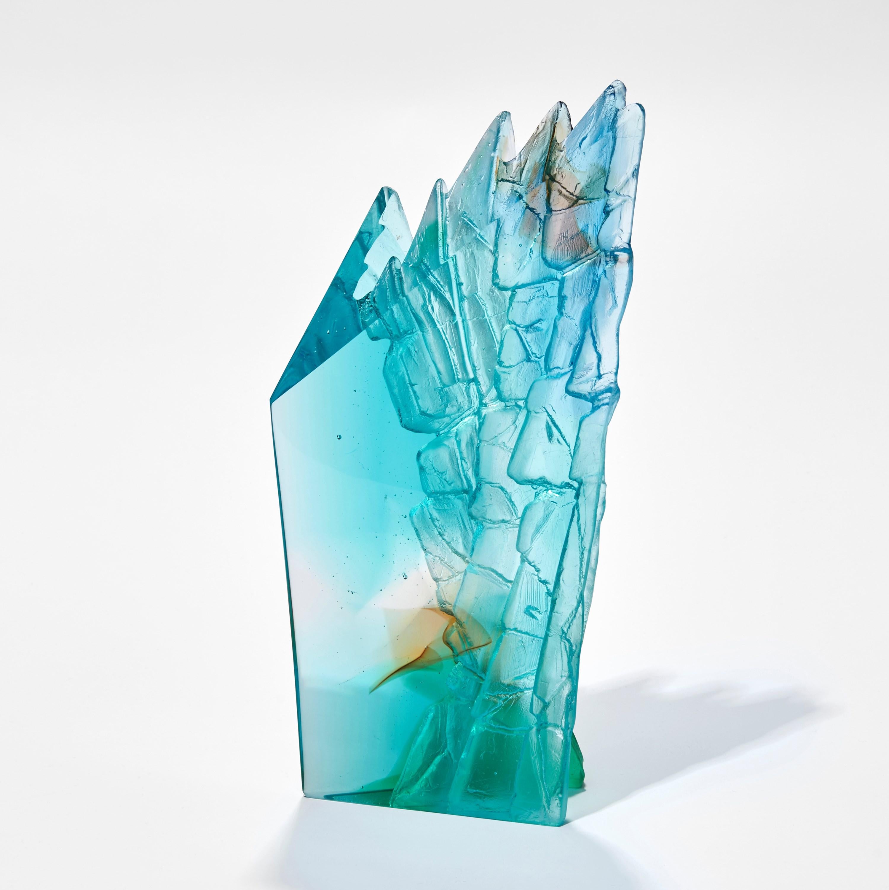 'Turquoise Cliff II' is a unique cast glass sculpture by the British artist, Crispian Heath.

Crispian Heath's work is predominantly inspired by landscape and his love for exploring the rugged cliffs and other geological sites which are unique to