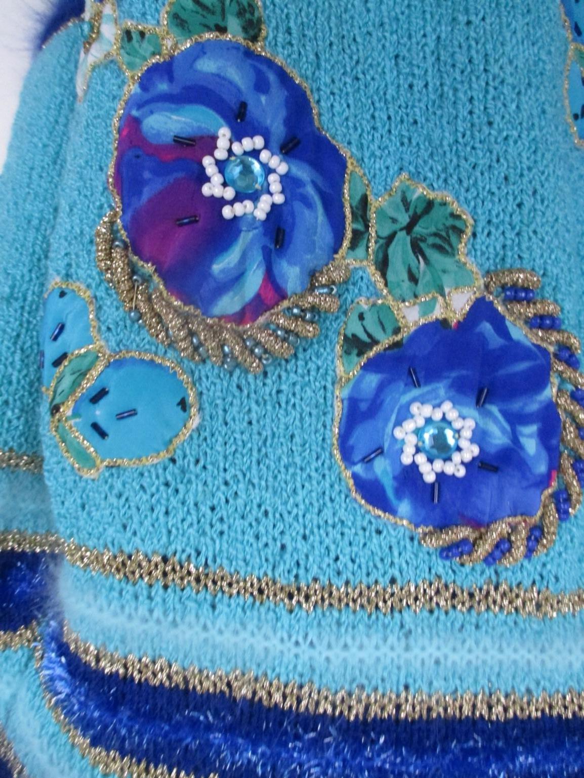 Turquoise coat with flower appliqués 2