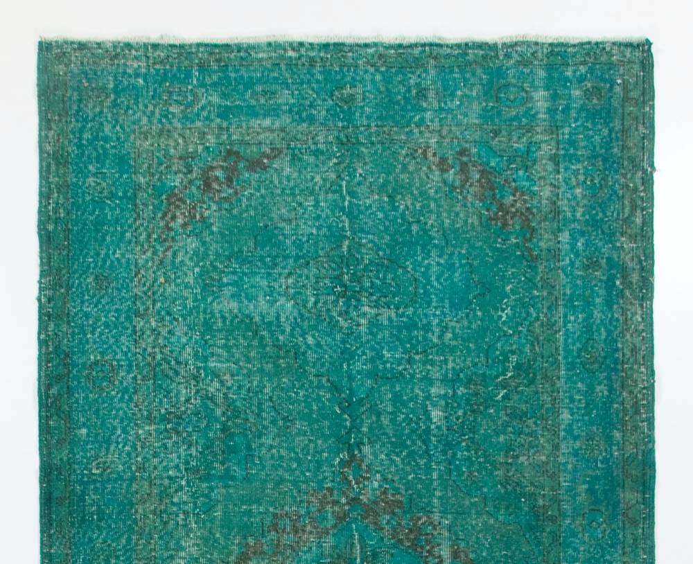 A vintage Turkish runner rug re-dyed in teal, blue green color. Measures: 5 x 13 ft.
Finely hand knotted, low wool pile on cotton foundation. Deep washed.
Sturdy and can be used on a high traffic area, suitable for both residential and commercial