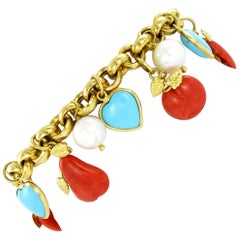 Turquoise Coral Pearl Diamond Yellow Gold Charm Bracelet