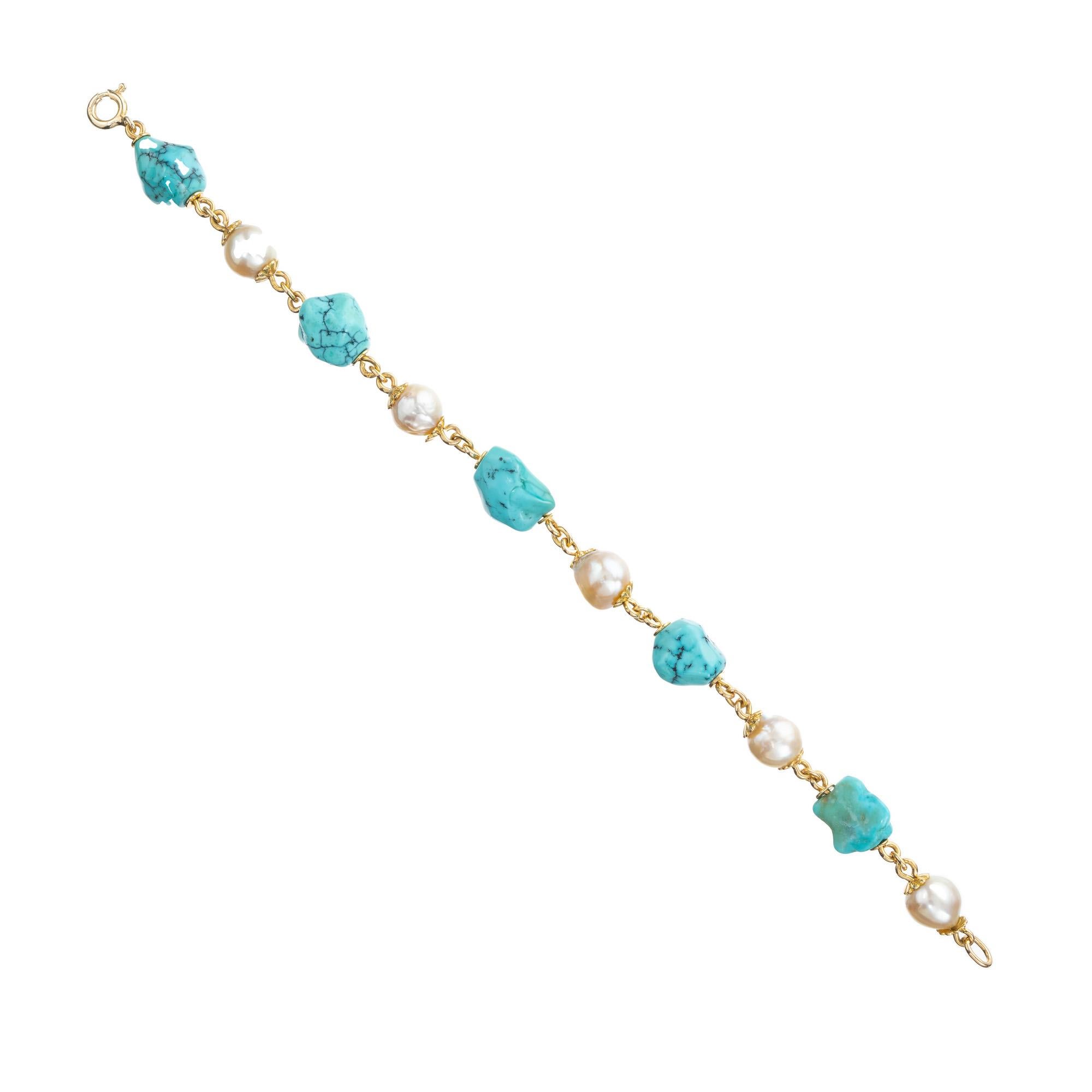 Wonderful 1950's handmade natural turquoise nugget bracelet with akoya cultured pearls. 5 semi baroque pearls that alternate with 5 natural blue turquoise nuggets. Heavy hand twisted 14k yellow gold wire, connects the gemstones. The bracelet