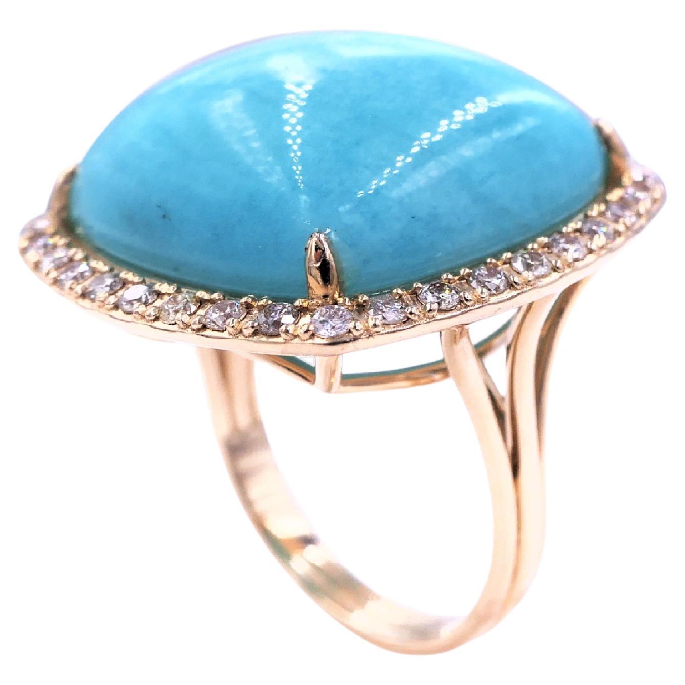 Turquoise Cushion Cabochon Halo Pave Silver Diamonds 14 Karat Yellow Gold Ring
14 Karat Yellow Gold
Turquoise Cushion Cabochon Gemstone
0.50 cts Diamonds
Size 7, Resizable upon request 

Important Information:
Please note that this item will take