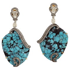 Boucles d'oreilles pendantes en or 18 carats et argent avec turquoise et diamants pavés