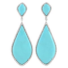 Boucles d'oreilles en or blanc 18 carats avec turquoise et diamants