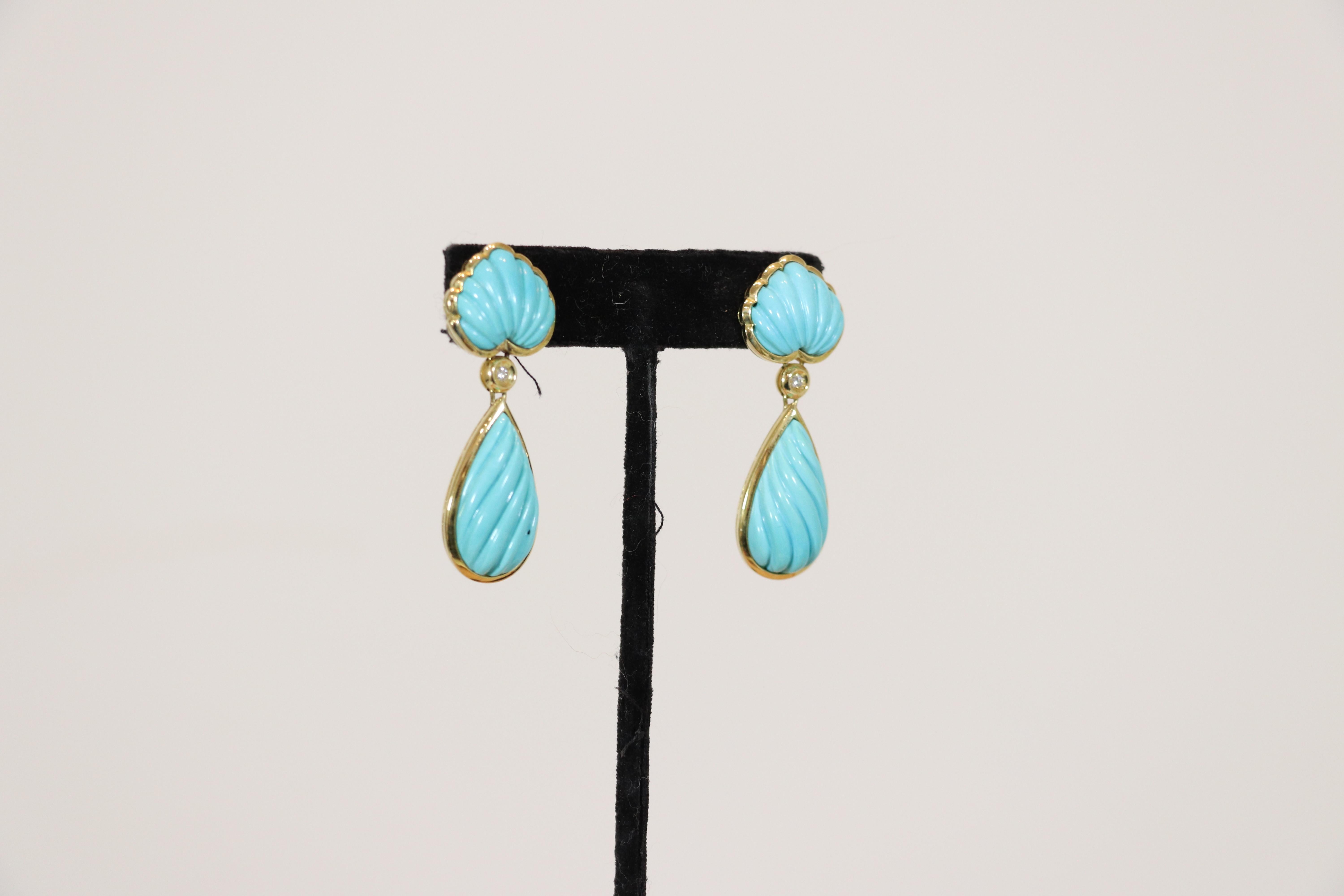 Stunning Sleeping Beauty carved turquoise and diamond earrings set in 18k yellow gold with pierced backings. Gorgeous color to the turquoise. Turquoise origin attributed to Sleeping Beauty mine, purchased at a high end jewelry store in Italy.