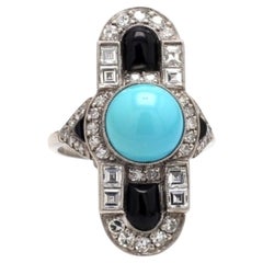 Anello con accenti di turchese, diamanti e onice