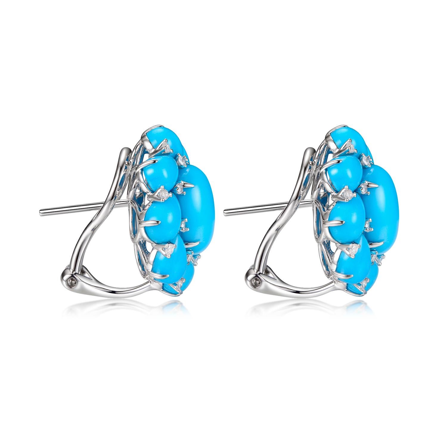 This turquoise earring features 2 oval turquoise in center weight 4.3 carats, surrounded by 7.43 carats of pear shape turquoise. Assented with 0.3 carat of white round diamonds. All turquoise use in production are from the prominent Sleeping Beauty