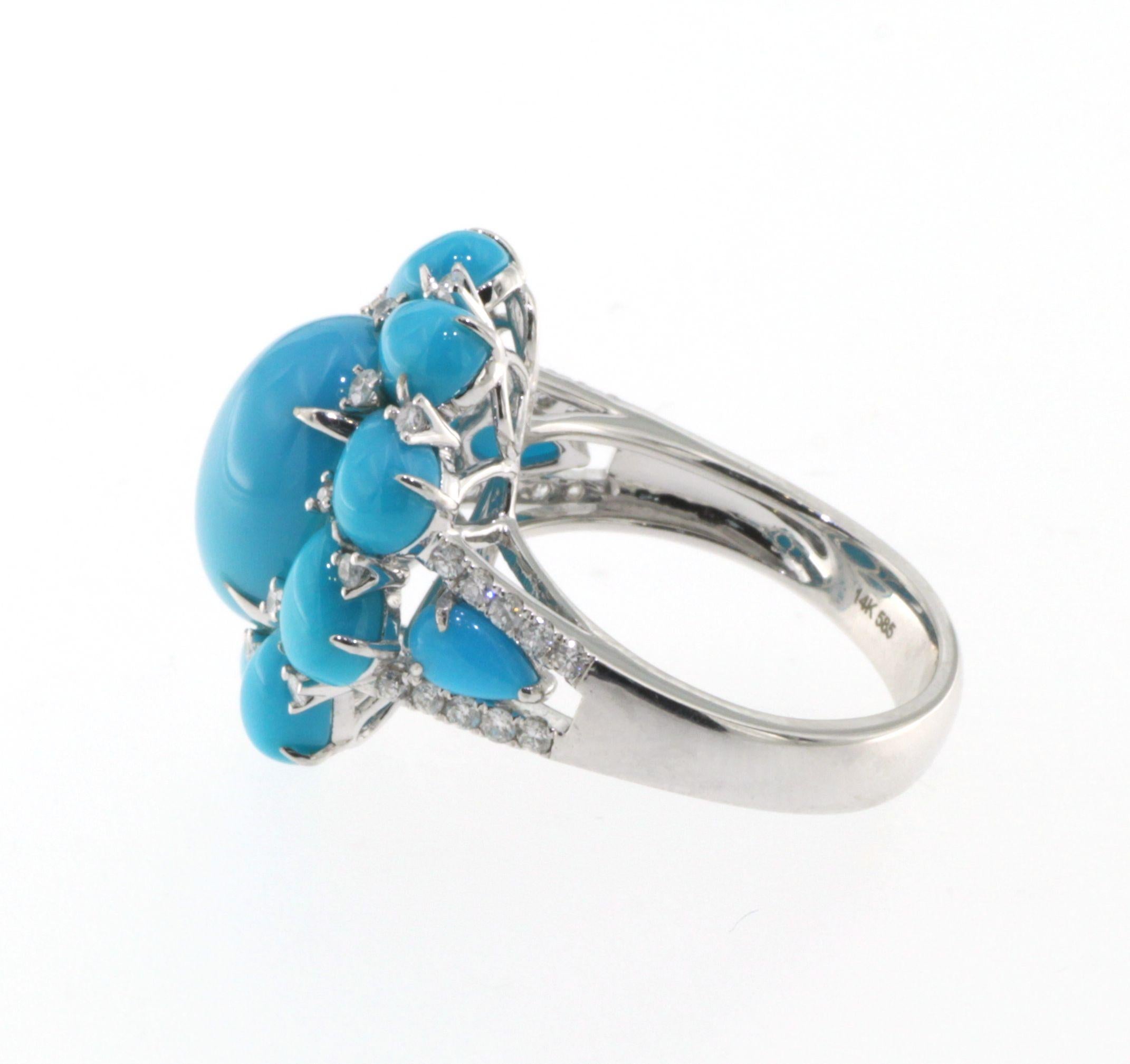 Oval Cut Turquoise Diamond Cluster Ring in 14 Karat White Gold