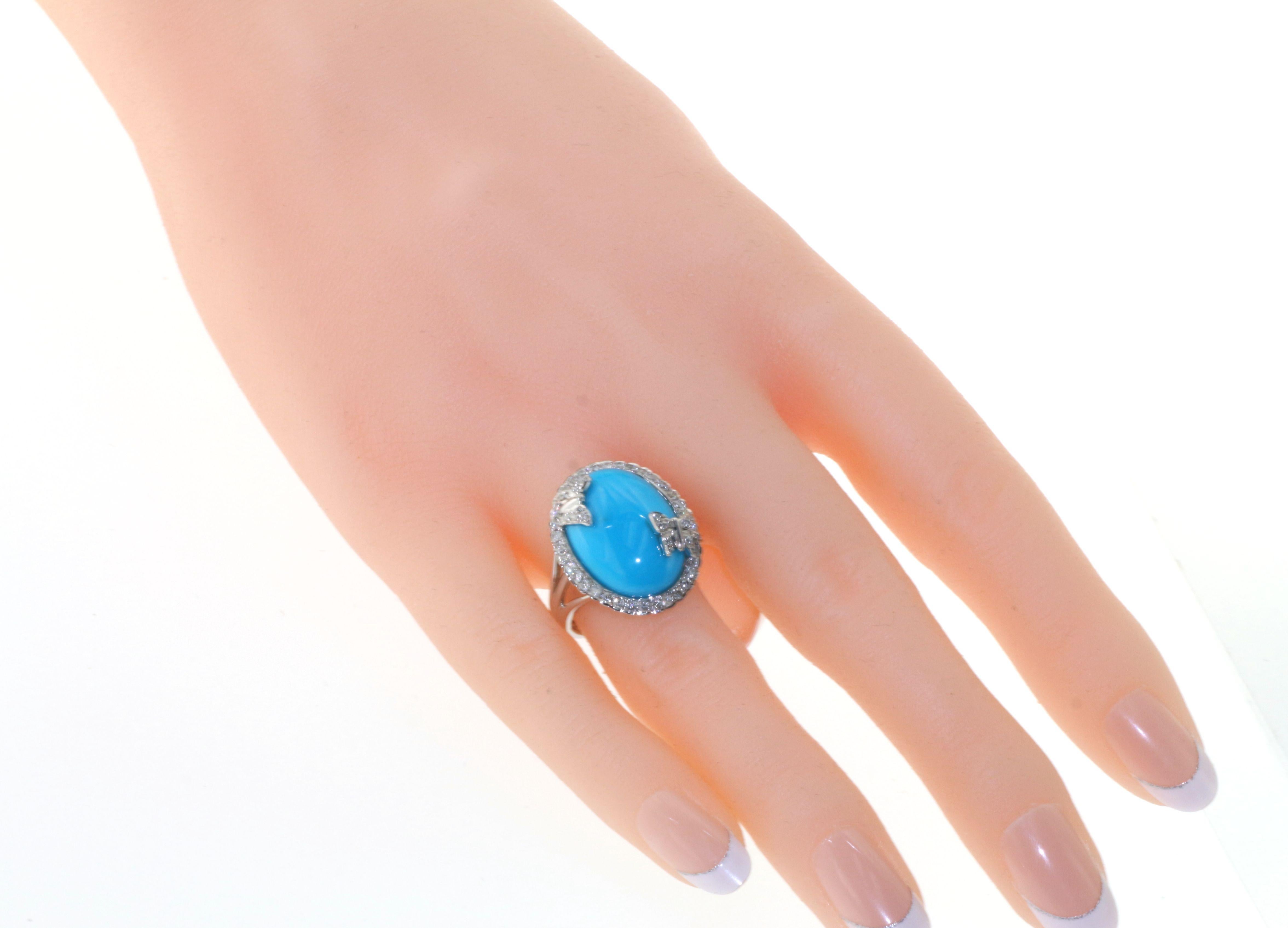 Step into a world of timeless elegance with our Sleeping Beauty turquoise ring, an embodiment of nature's purest hues and exquisite craftsmanship. At its heart lies a 9.55-carat oval cabochon turquoise, meticulously sourced from the renowned