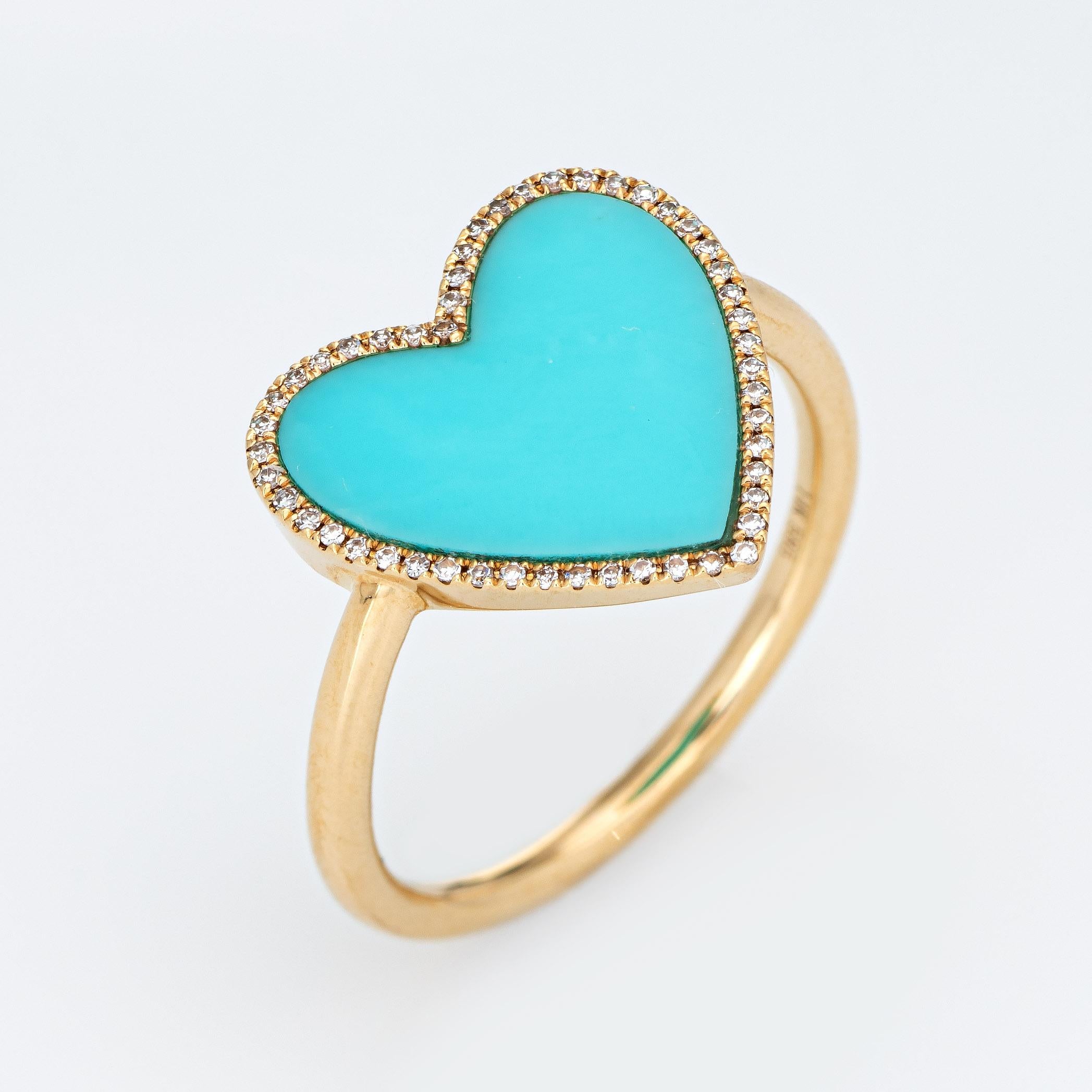 Stylish turquoise & diamond heart ring crafted in 14 karat yellow gold. 

Turquoise measures 12mm (in excellent condition and free of cracks or chips). Diamonds total an estimated 0.09 carats (estimated at H-I color and VS2-SI2 clarity). 

The egg