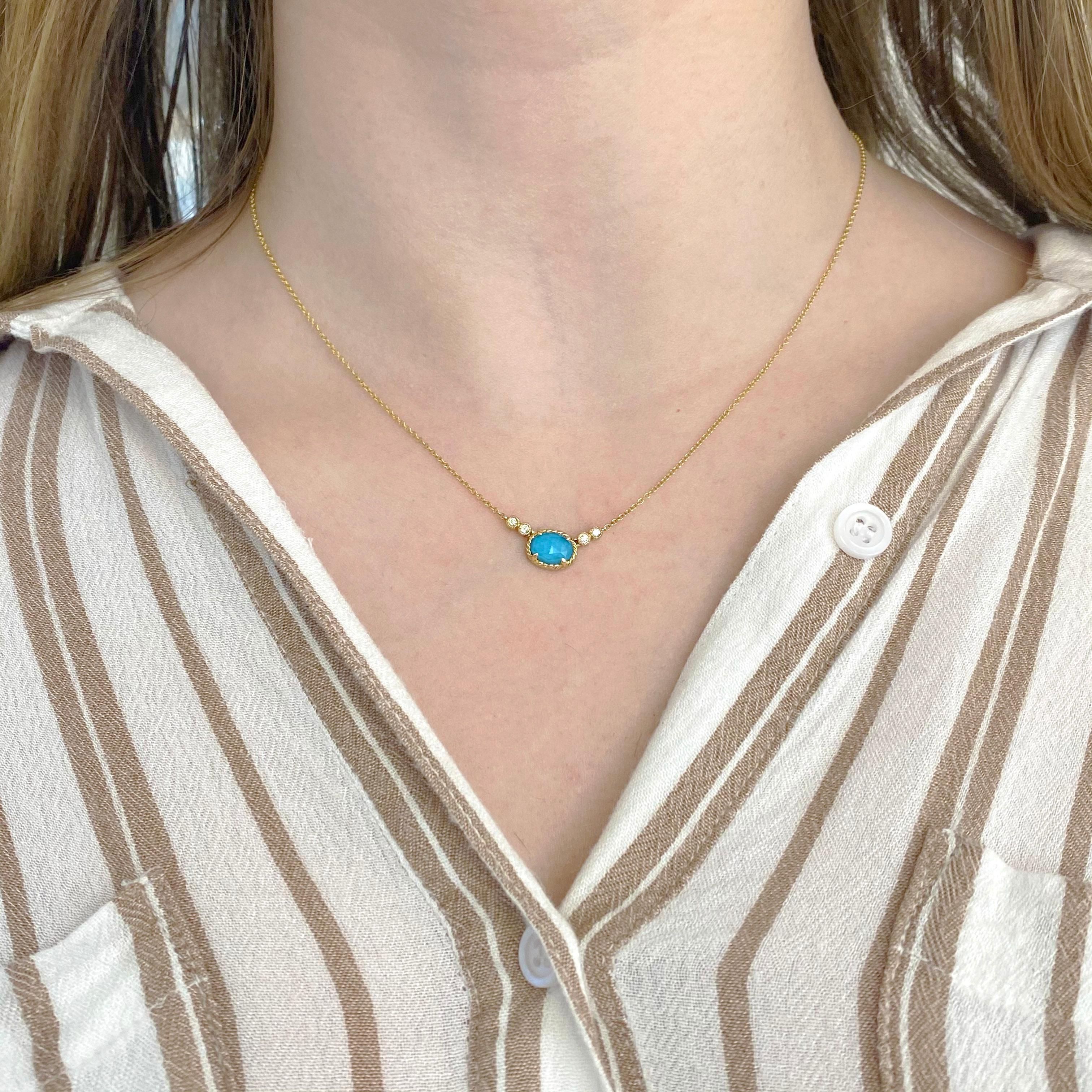 This designer turquoise and diamond necklace is very attractive and unique!  The turquoise is combined with white quartz so that it really reflects the light and then there are two accent diamonds on either side.  The rope design around the