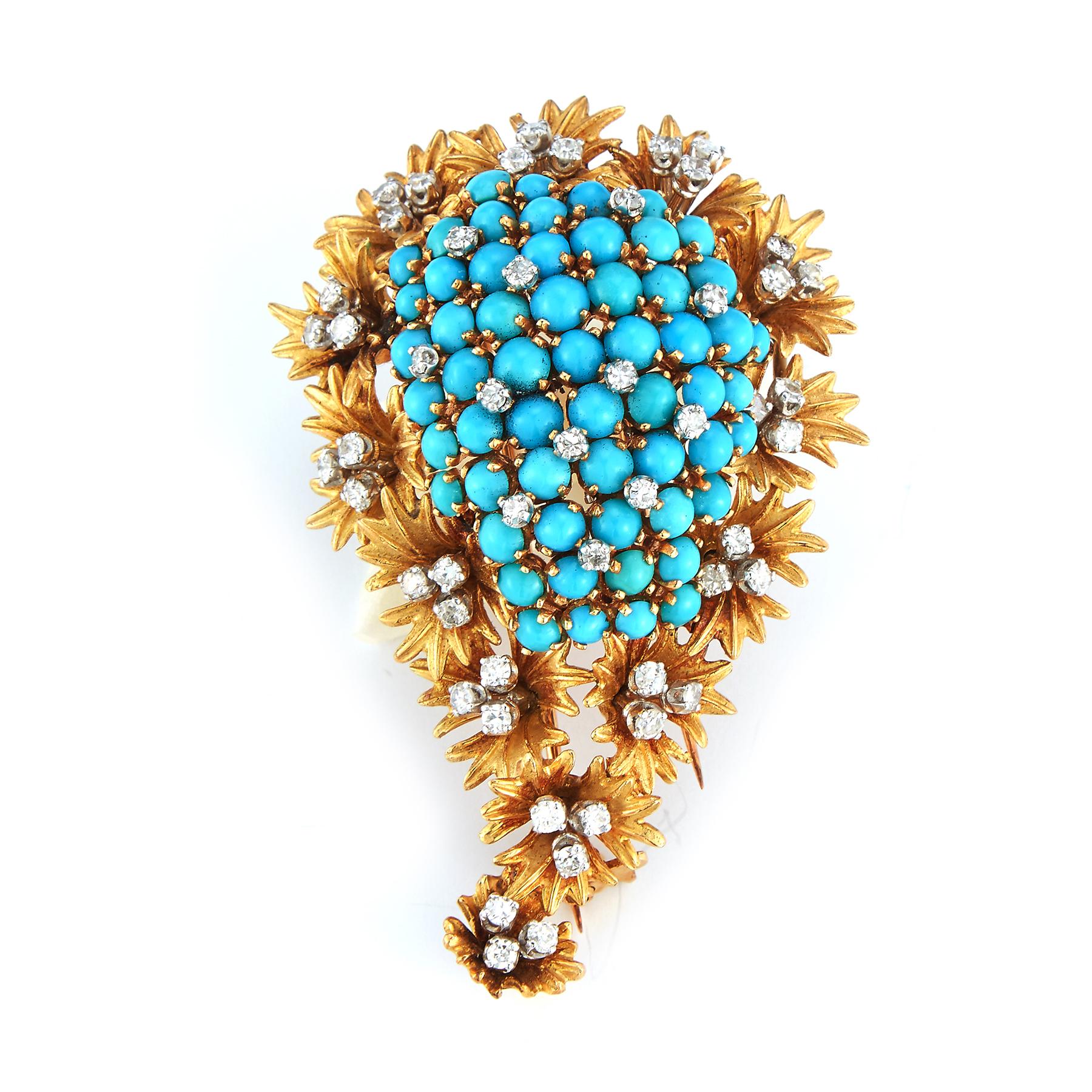 Turquoise & Diamond Paisley Brooch, a cluster of cabochon turquoise with round cut surrounded by carved yellow gold flowers. 

Measurements: 2.5