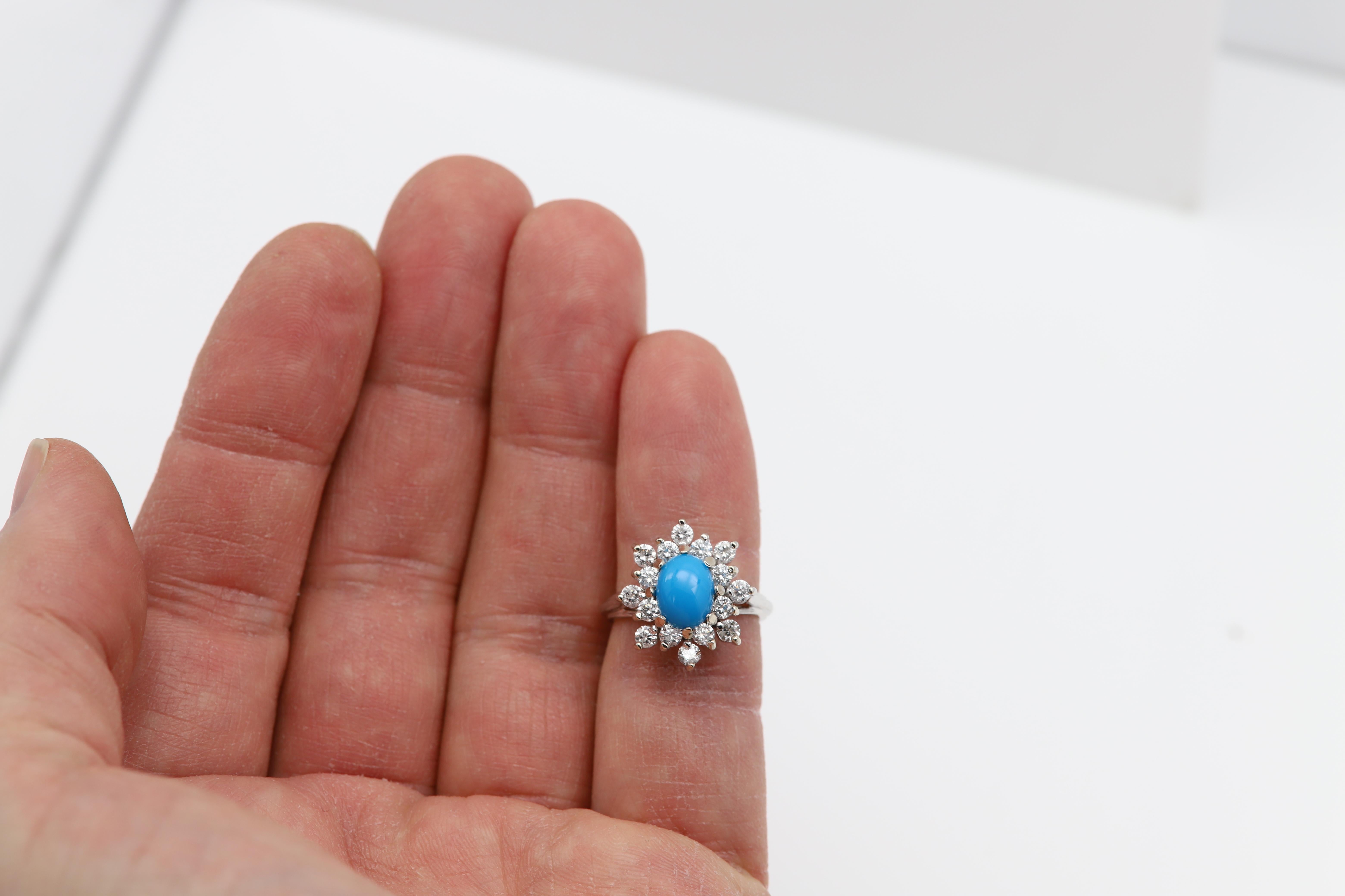 Vintage Brilliant Turquoise Ring with Diamonds
14k White Gold 8.70 grams
overall design size is approx. 15 x 15mm
Stone size oval cabochon 8 x 6 Persian Turquoise
finger size 6.5
Brilliant Diamonds appox 1.10 carat G-H-SI-VS
Circa 1950
Nice Gift