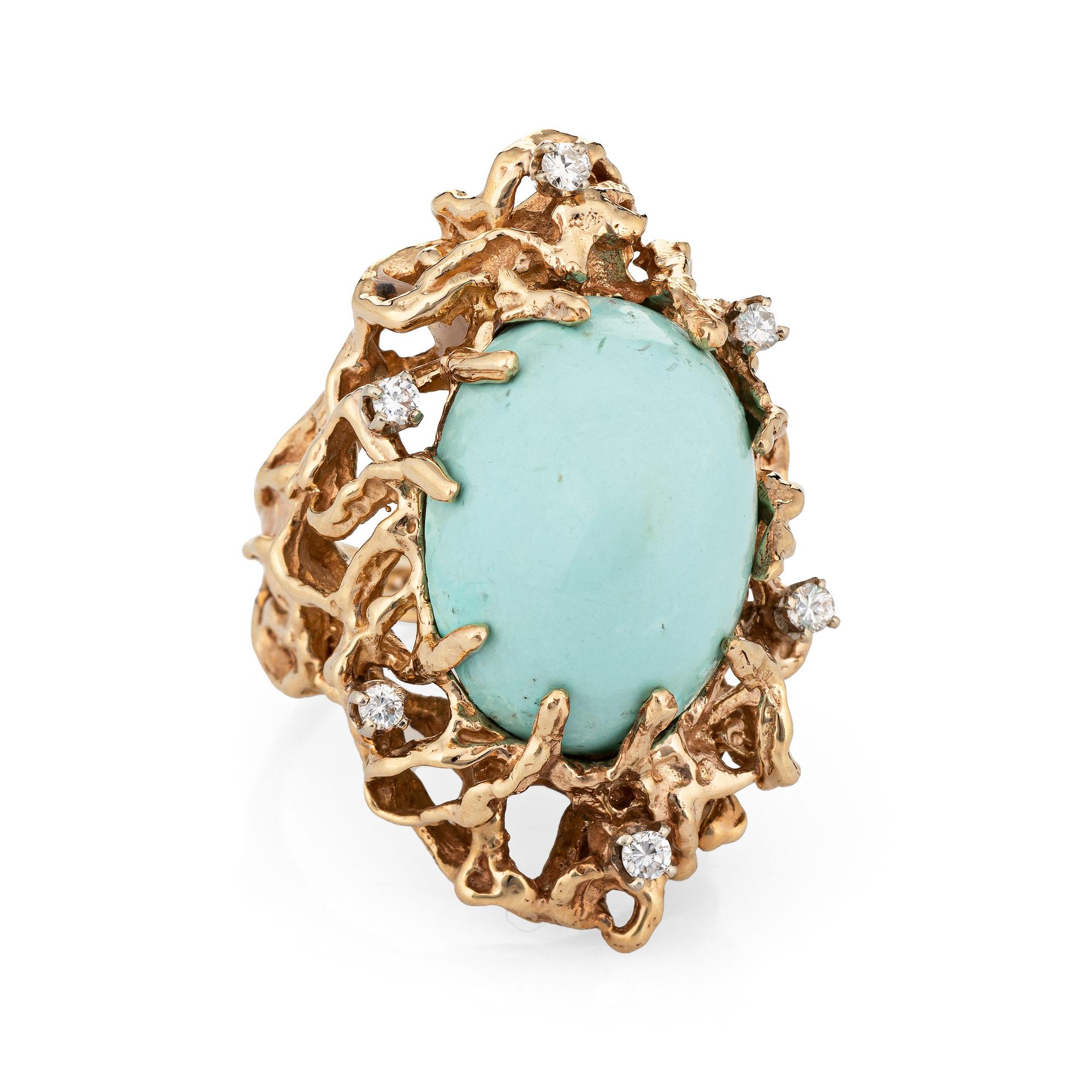 Stylish vintage turquoise & diamond large abstract ring (circa 1960s to 1970s) crafted in 14 karat yellow gold. 

Cabochon cut turquoise measures 120mm x 15mm (estimated at 32 carats), accented with an estimated 0.18 carats of diamonds (estimated at