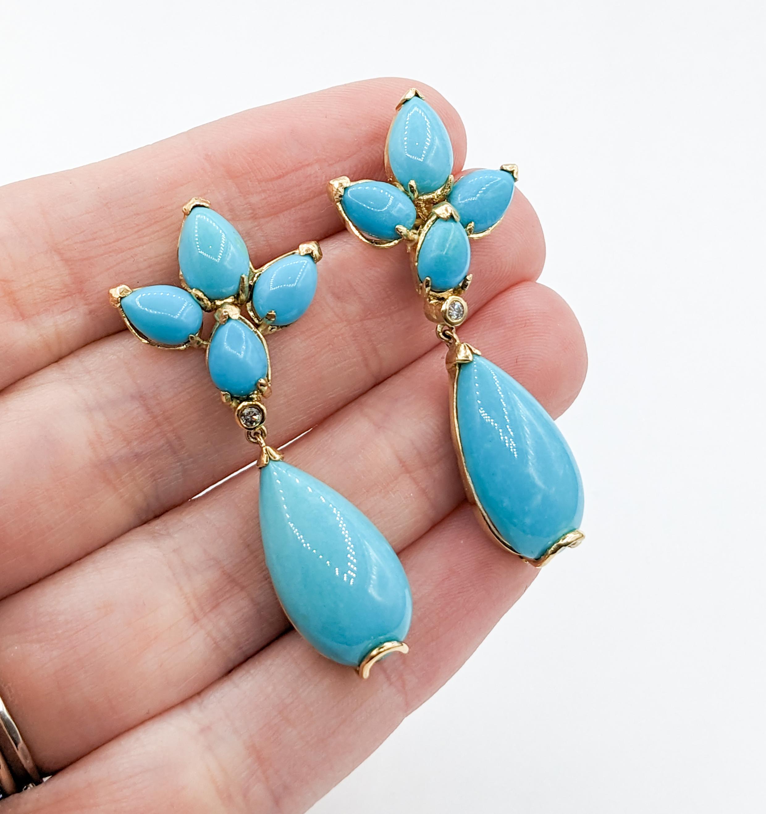 Turquoise & Diamond Statement Earrings in Gold

Introducing these stunning turquoise statement earrings in 14 karat yellow gold, a true testament to beauty and craftsmanship. These fantastic earrings feature a touch of elegance, with 7.2 ctw of