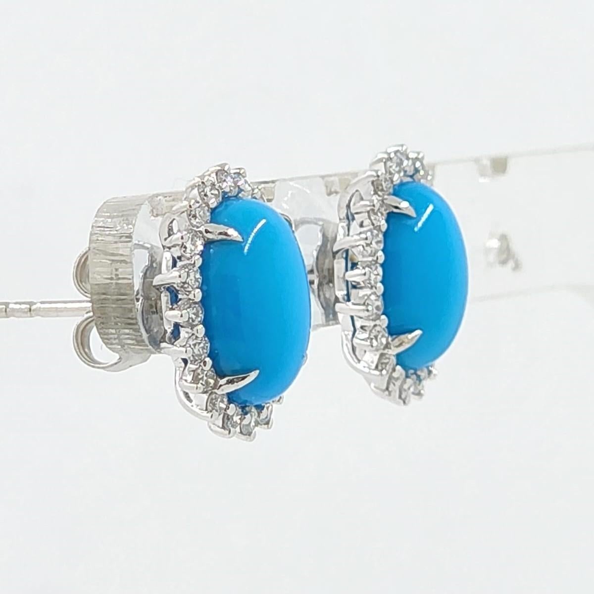 Introducing our elegant Sleeping Beauty Turquoise and Diamond Earrings. Set in 18 karat white gold, these earrings showcase 4.45 carats of the sought-after Sleeping Beauty Turquoise, famed for its pure blue color. Accenting this vibrant hue are 0.51