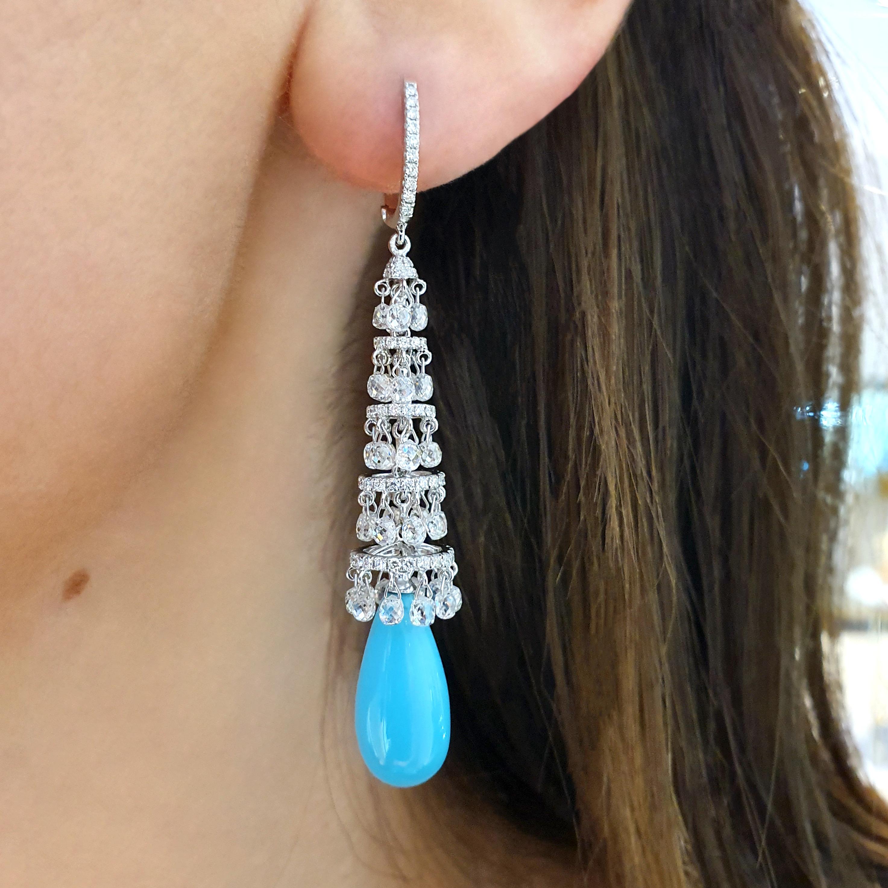 Drop Chandelier Earrings in white gold 18K briolette cut 6.07 carat and round diamond 0.84 carat estimated G color holding one Turquoise drop each, total 13.53 carat.
Total gross weight: 9.32 grams.
Total length: 5.00 centimeters.
