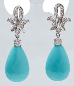 Turquoise, Diamonds, 14 Karat White Gold Earrings.