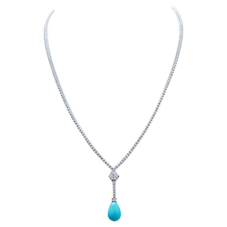 Elegant necklace in 14 kt white gold structure mounted with diamonds for all the length. Below, a flower of diamonds and , as pendant, a drop turquoise.
Diamonds 3.96 ct
Turquoise 1.00 gr
Total Weight 16.70 gr
RF ++GUOGH

For any informations, feel