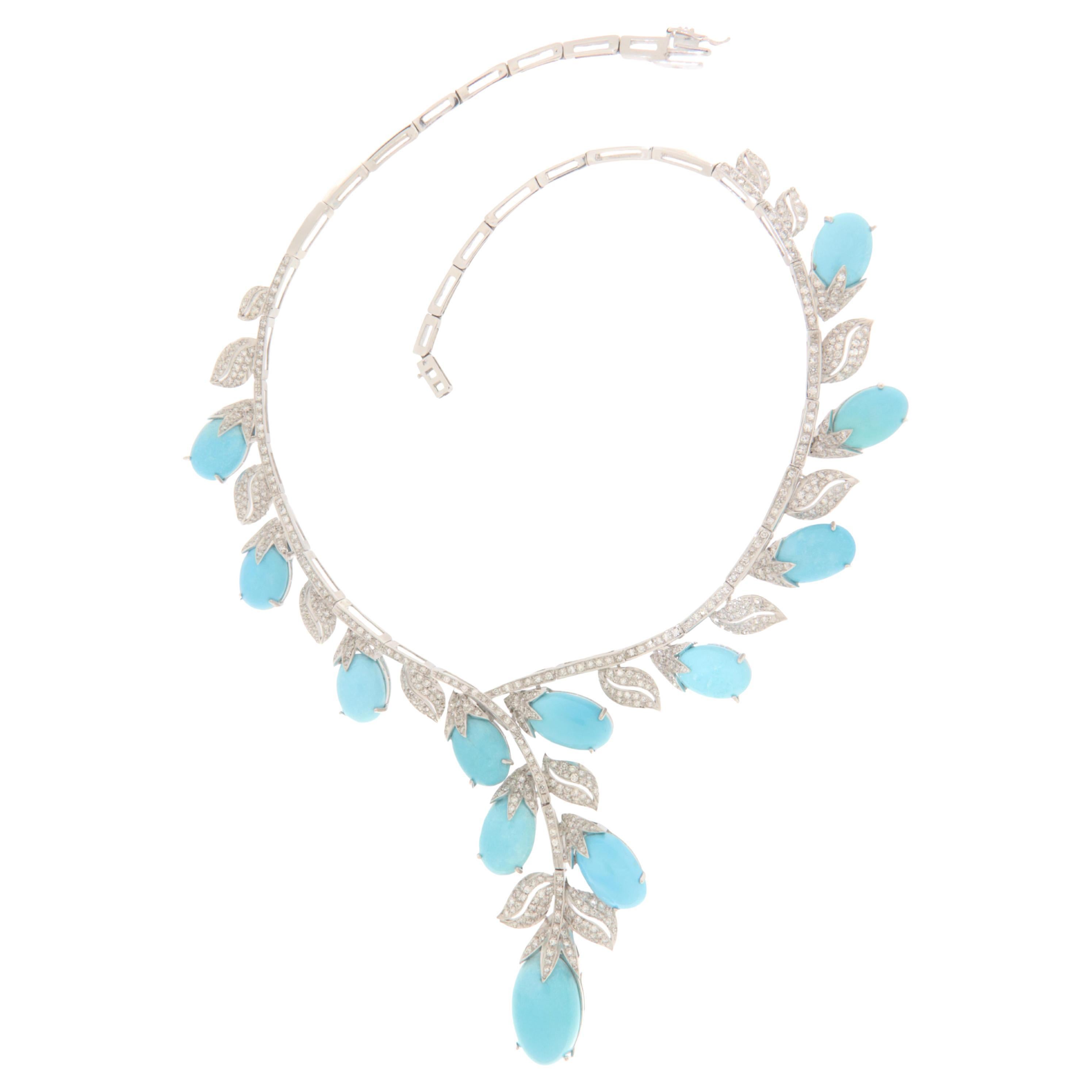 This exquisite and exclusive necklace in 18-karat white gold is a timeless piece, ideal for those seeking an item with great aesthetic impact. Crafted with artisanal precision, the necklace features a series of natural turquoise stones from Arizona,