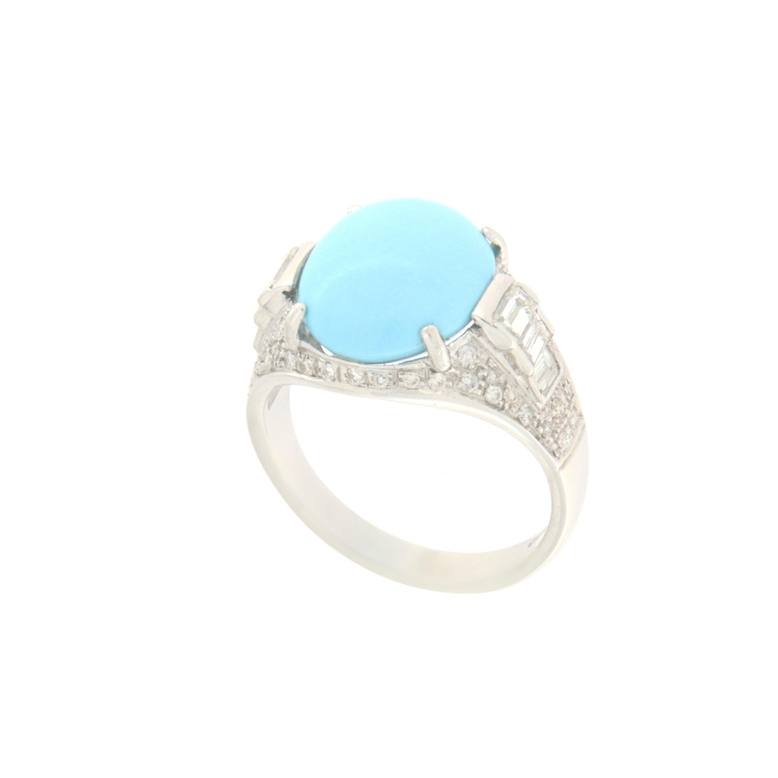 Handcraft 18 karat white gold cocktail ring.Handmade by artisans assembled with turquoise and diamonds

Ring total weight 8.20 grams
Diamonds weight 0.31 karat
Turquoise weight 2 grams
Ring size 17.85 ita 8.35 Us
(all rings are can be resized)