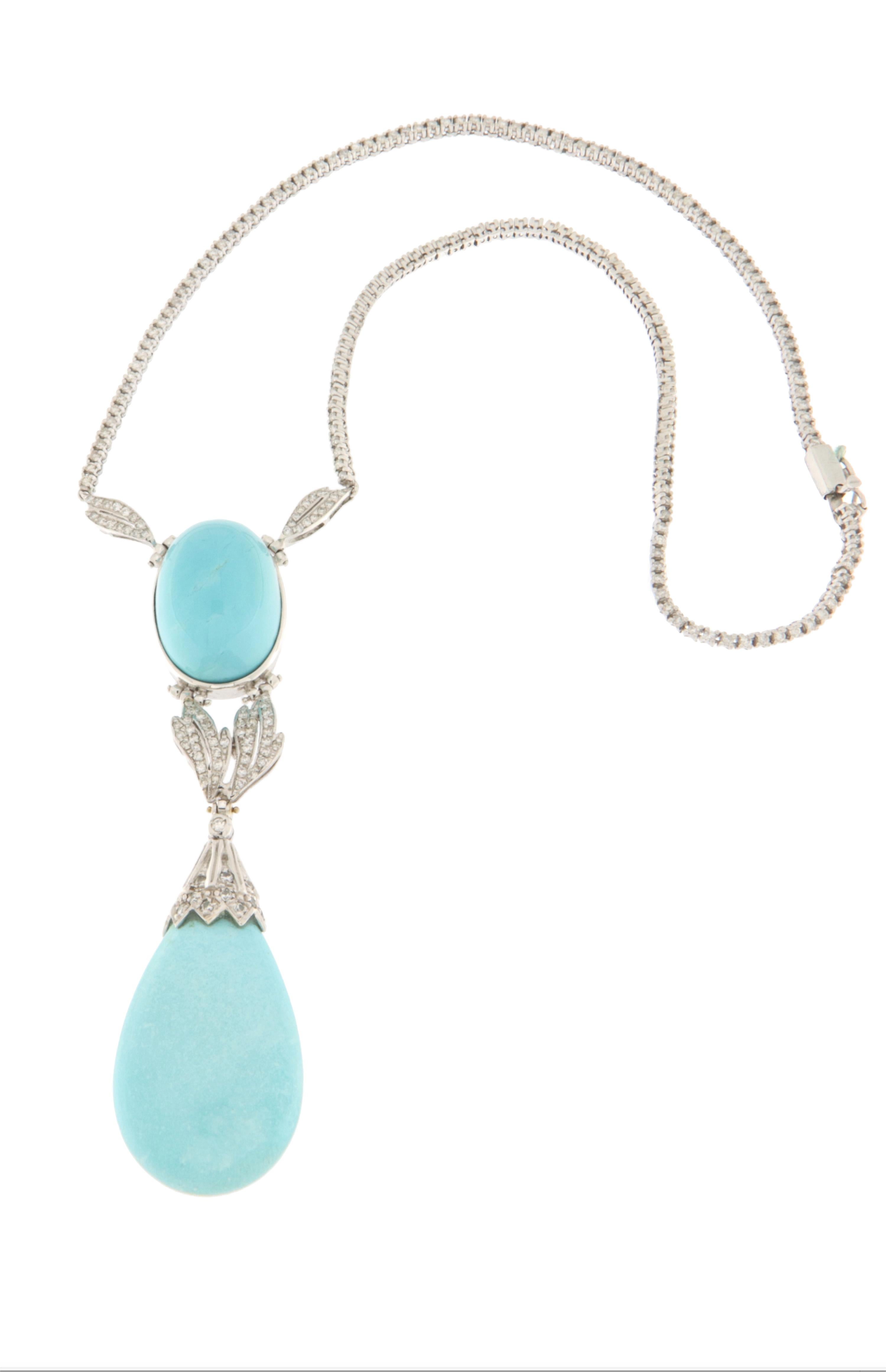 This extraordinary necklace represents the perfect balance between luxury and elegance, crafted in 18K white gold and adorned with a refined combination of brilliant-cut diamonds and high-quality natural turquoise.

The sophisticated design of this