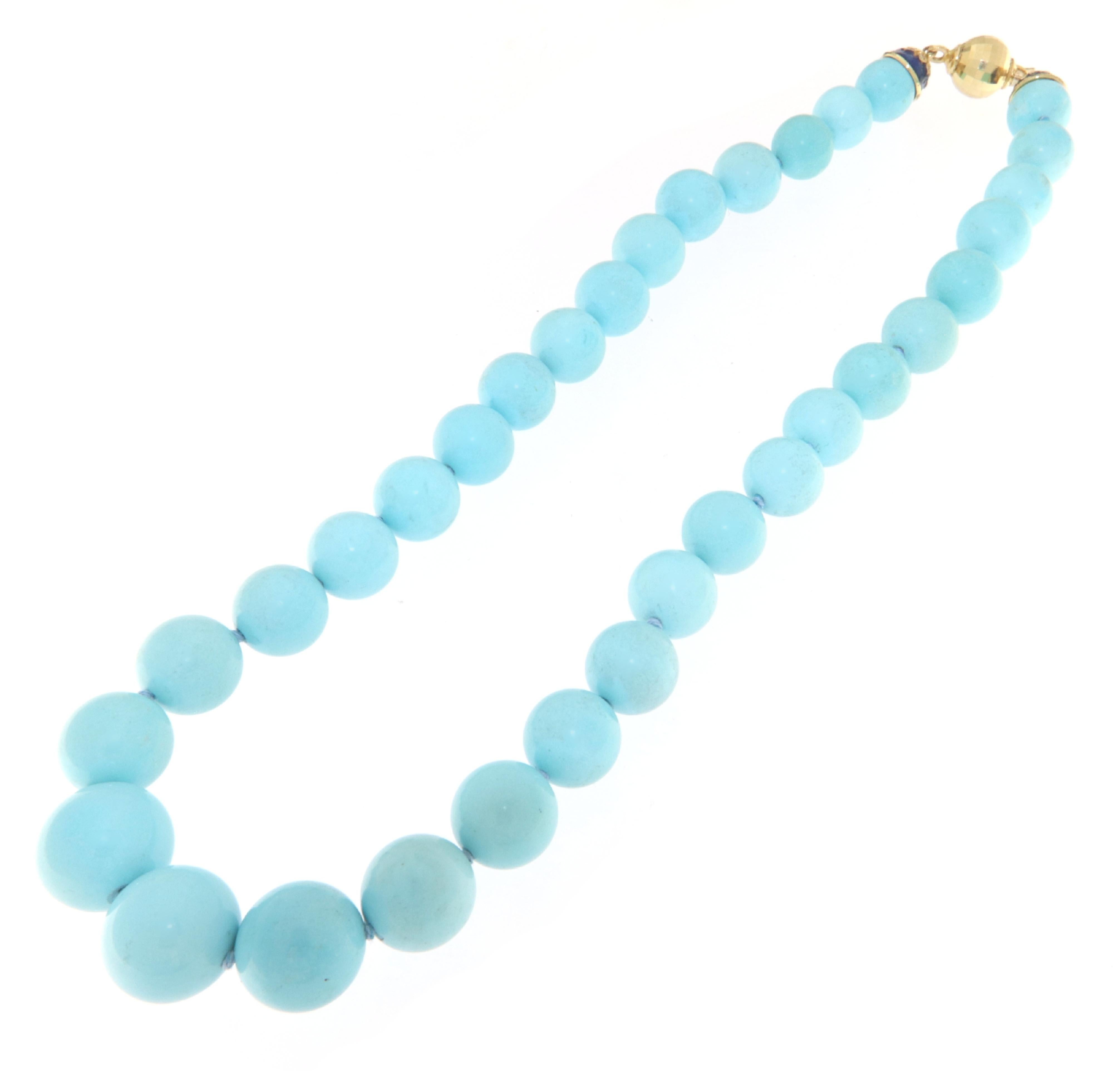 This magnificent necklace is crafted in 18-karat yellow gold and features an extraordinary combination of natural turquoise from Arizona, diamonds, and blue enamel. Each turquoise bead is carefully selected for its vibrant color and exceptional