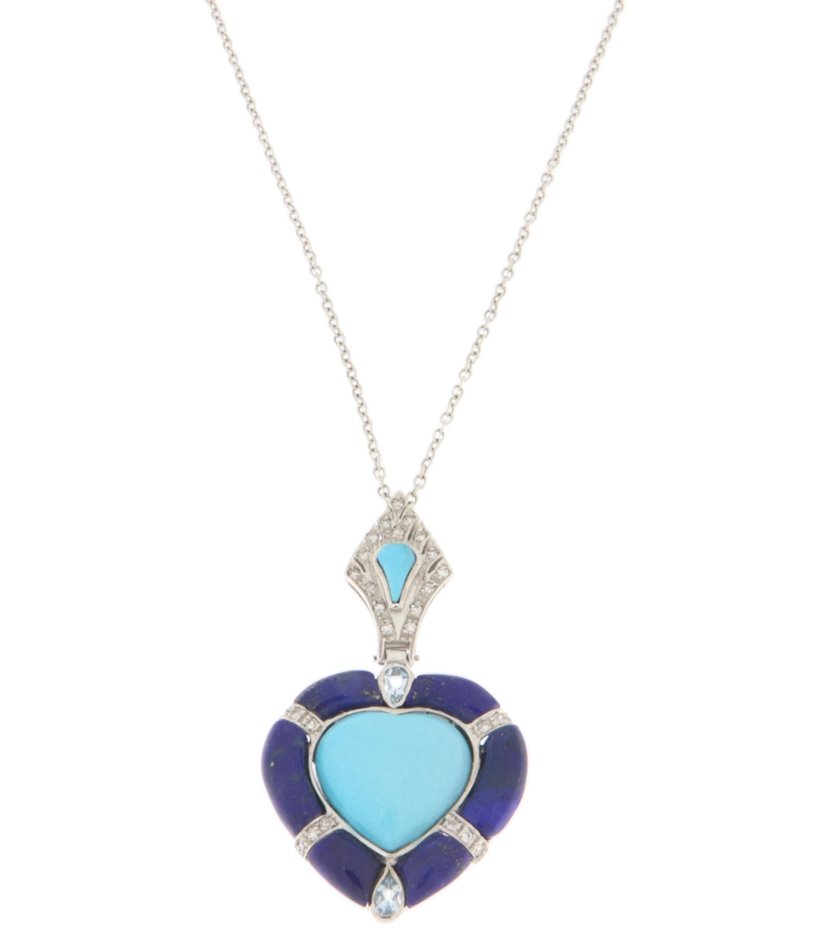 This 18-karat white gold pendant is a unique piece of fine jewelry, crafted with exceptional attention to detail and a design that combines precious materials elegantly. At the center of the composition lies a heart-shaped turquoise gemstone sourced