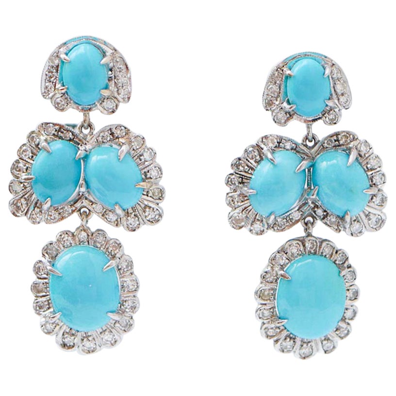 Boucles d'oreilles en turquoise, diamants et or blanc.