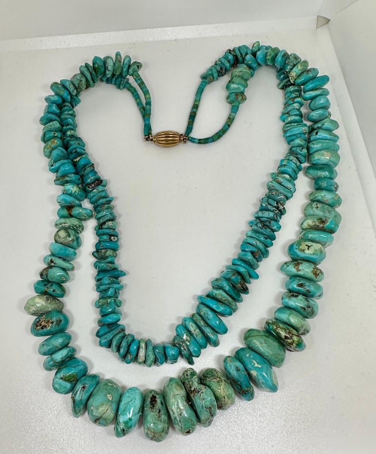 This is an absolutely exquisite large chunky natural Turquoise Double Strand Necklace with a fabulous 14 Karat Yellow Gold barrel clasp from the estate of Hollywood Legend Mary Lou Daves.  Ms. Daves' jewelry exemplified her exquisite taste.  Her